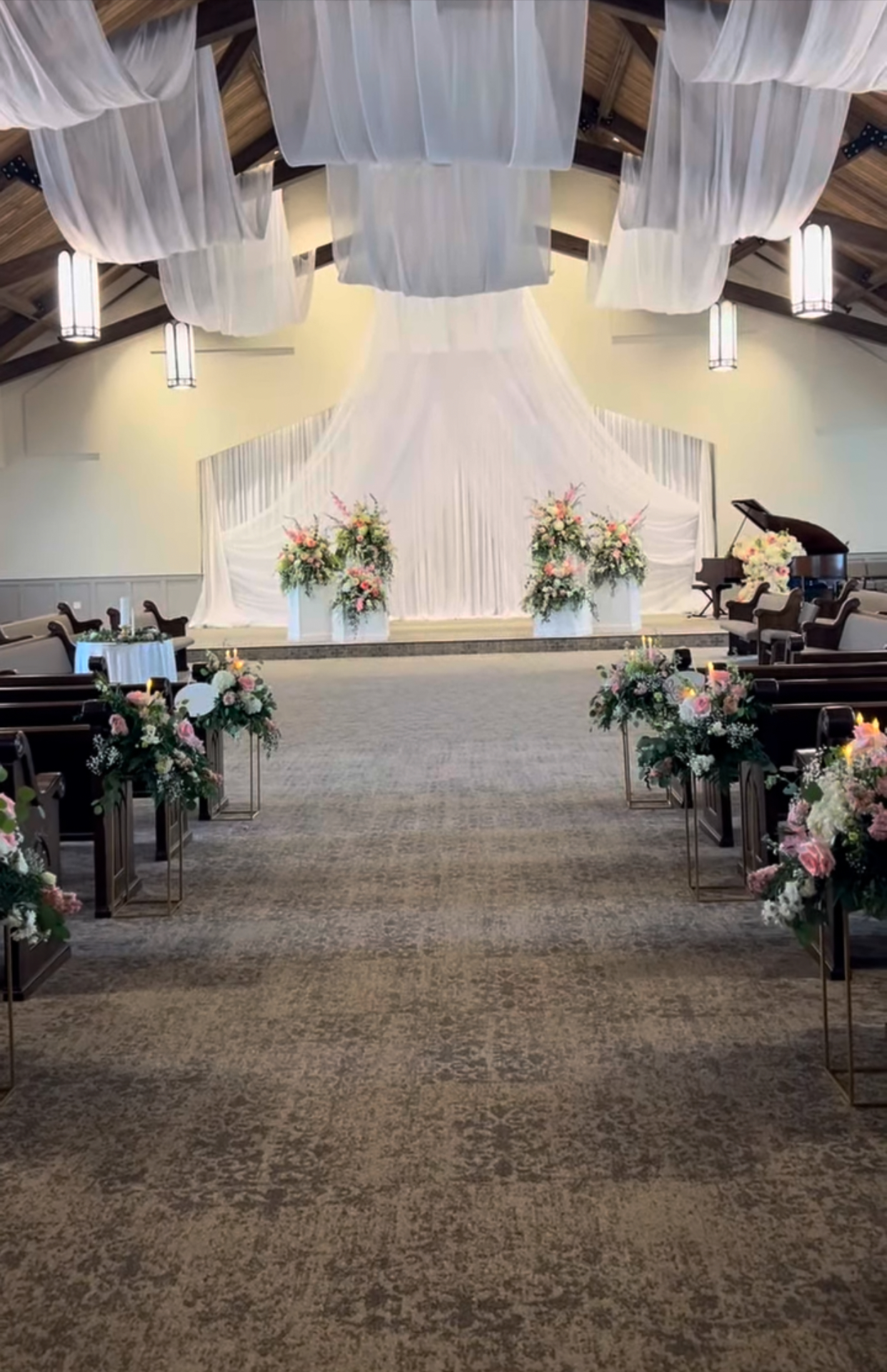 wedding ceremony altar and aisle flowers