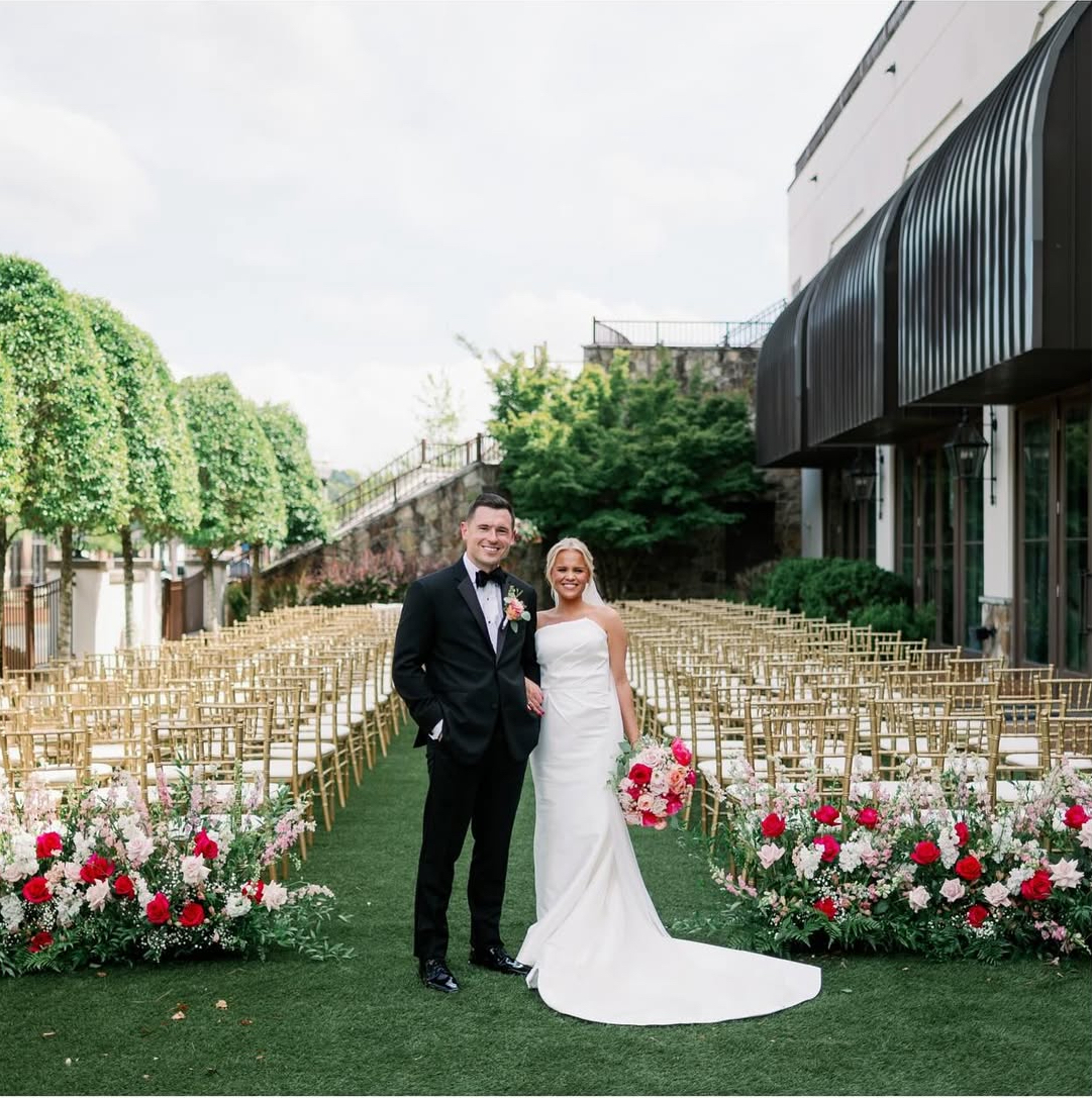 pink and white wedding ceremony flowers