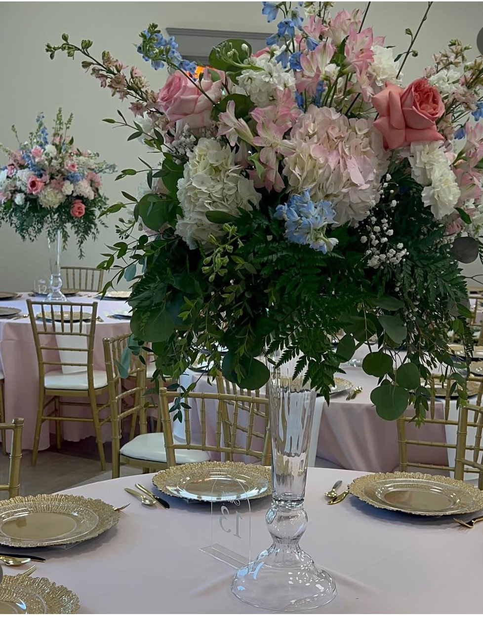 tall floral centerpiece for wedding reception